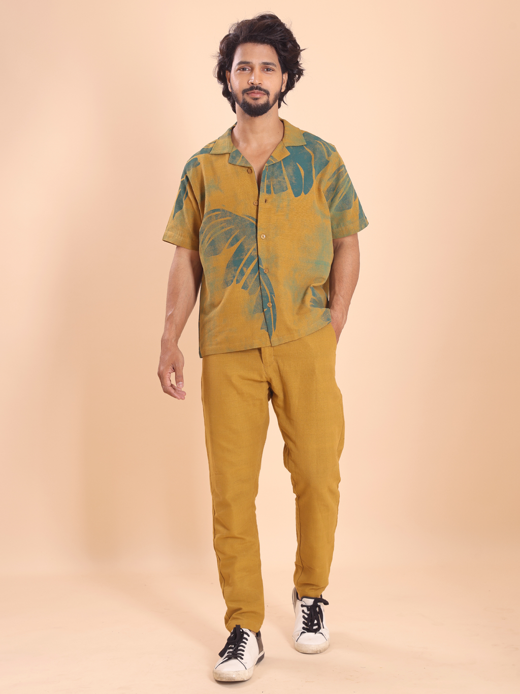 Close-up of teal hand-printed pattern on men's cotton shirt