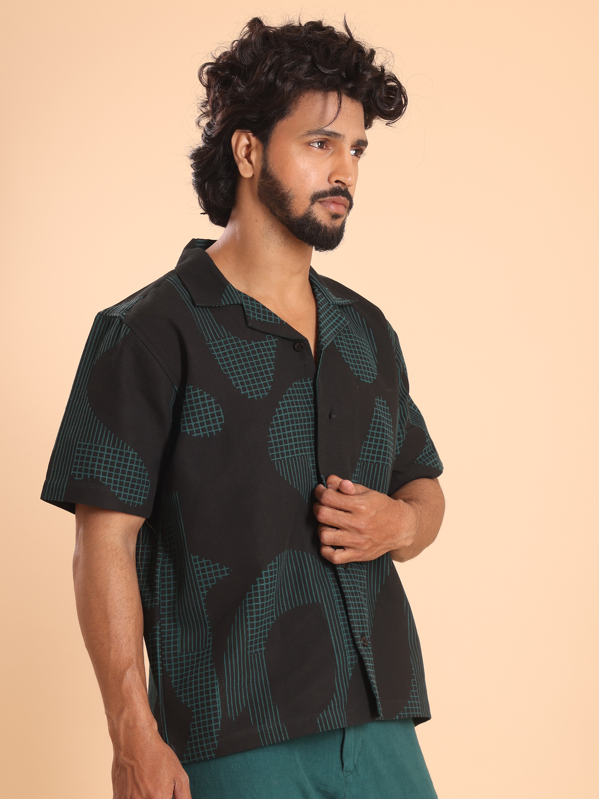 Back view of men's handspun cotton geometric print shirt
