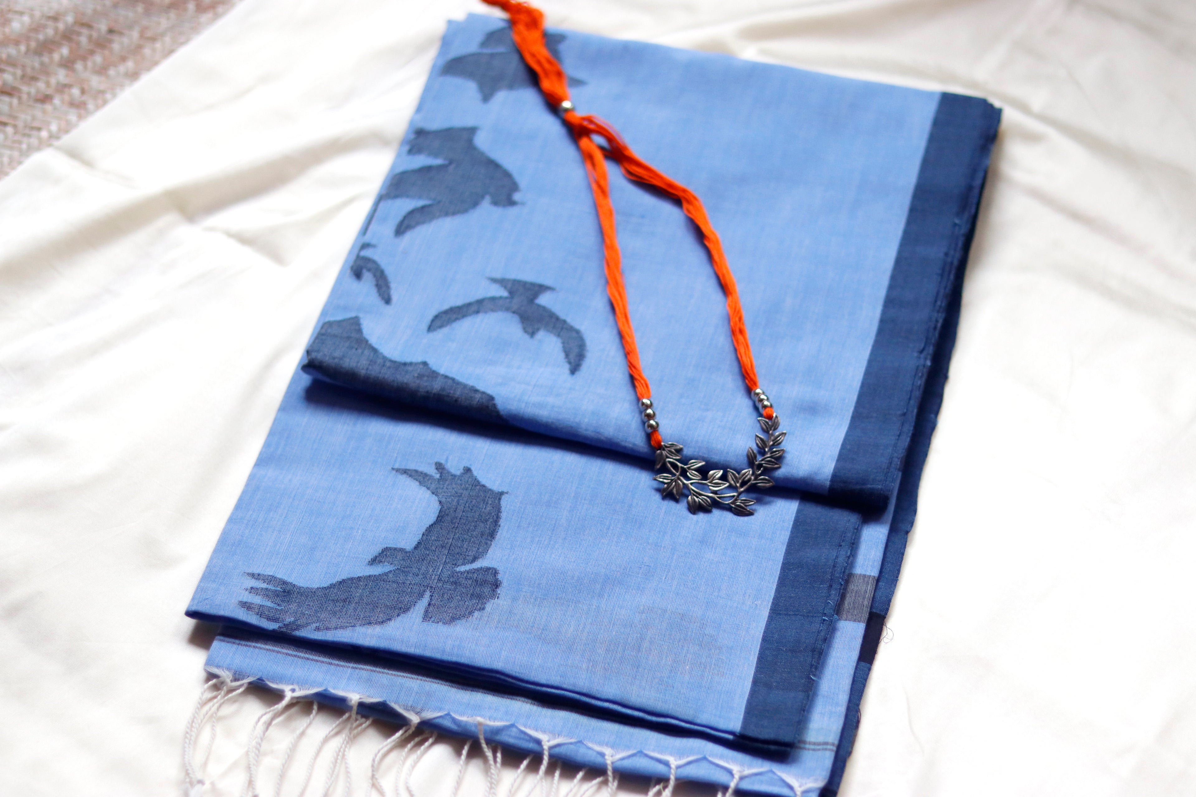 glass blue jamdani saree with flying birds